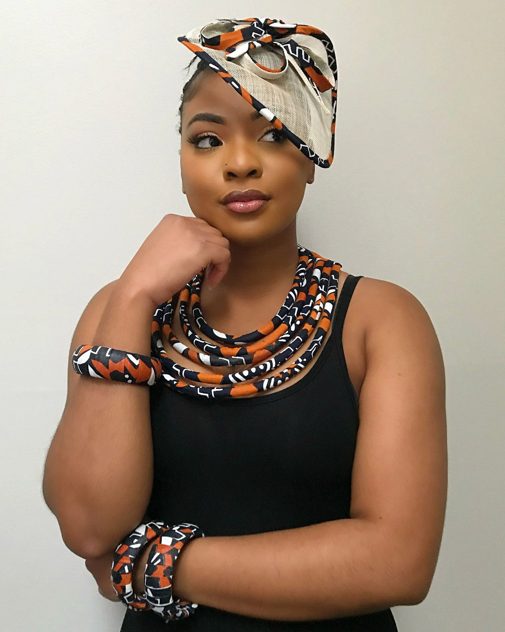 Cowria African Print Fascinator Hat - Brown / Black / White