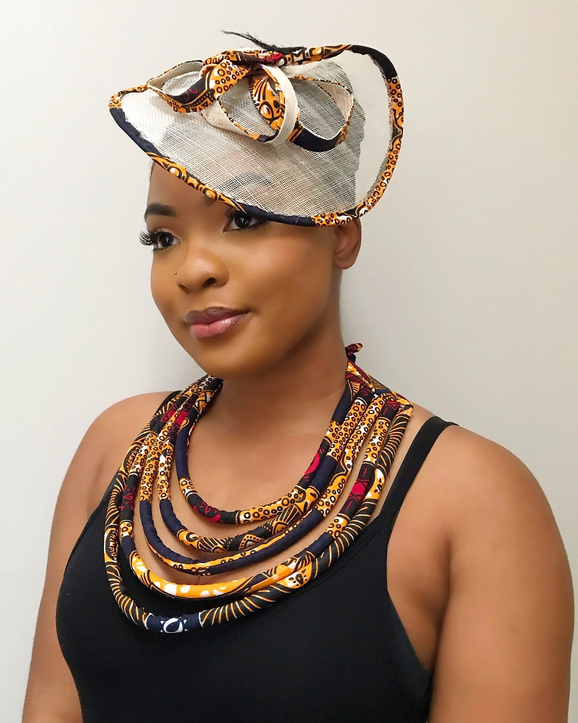 Bessa African Print Fascinator Hat - Navy blue / Orange