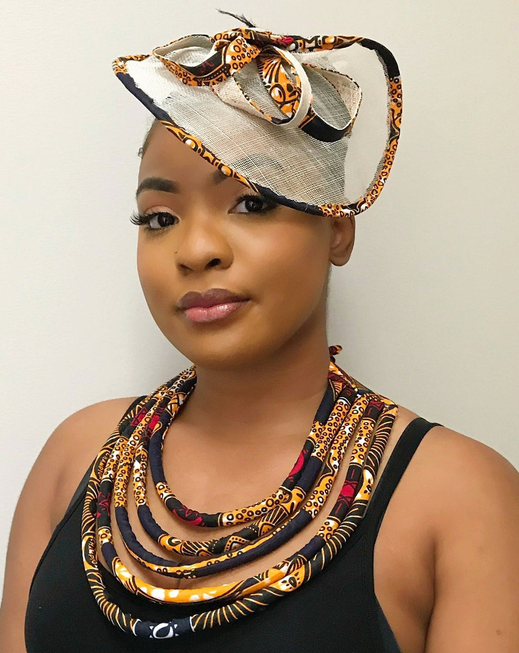 Bessa African Print Fascinator Hat - Navy blue / Orange
