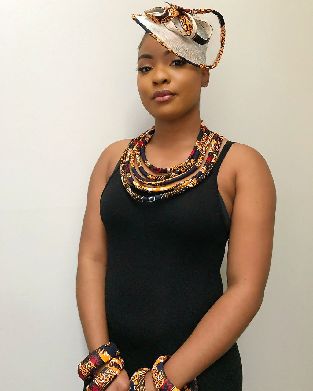 Bessa African Print Fascinator Hat - Navy blue / Orange